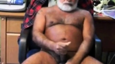 Silver daddy bear stroking his nice cock