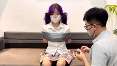 Xiaohua wrapped in tape