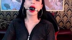 Secretary Kristy Types while Ball Gagged